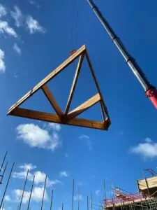 Roof truss lift in progress